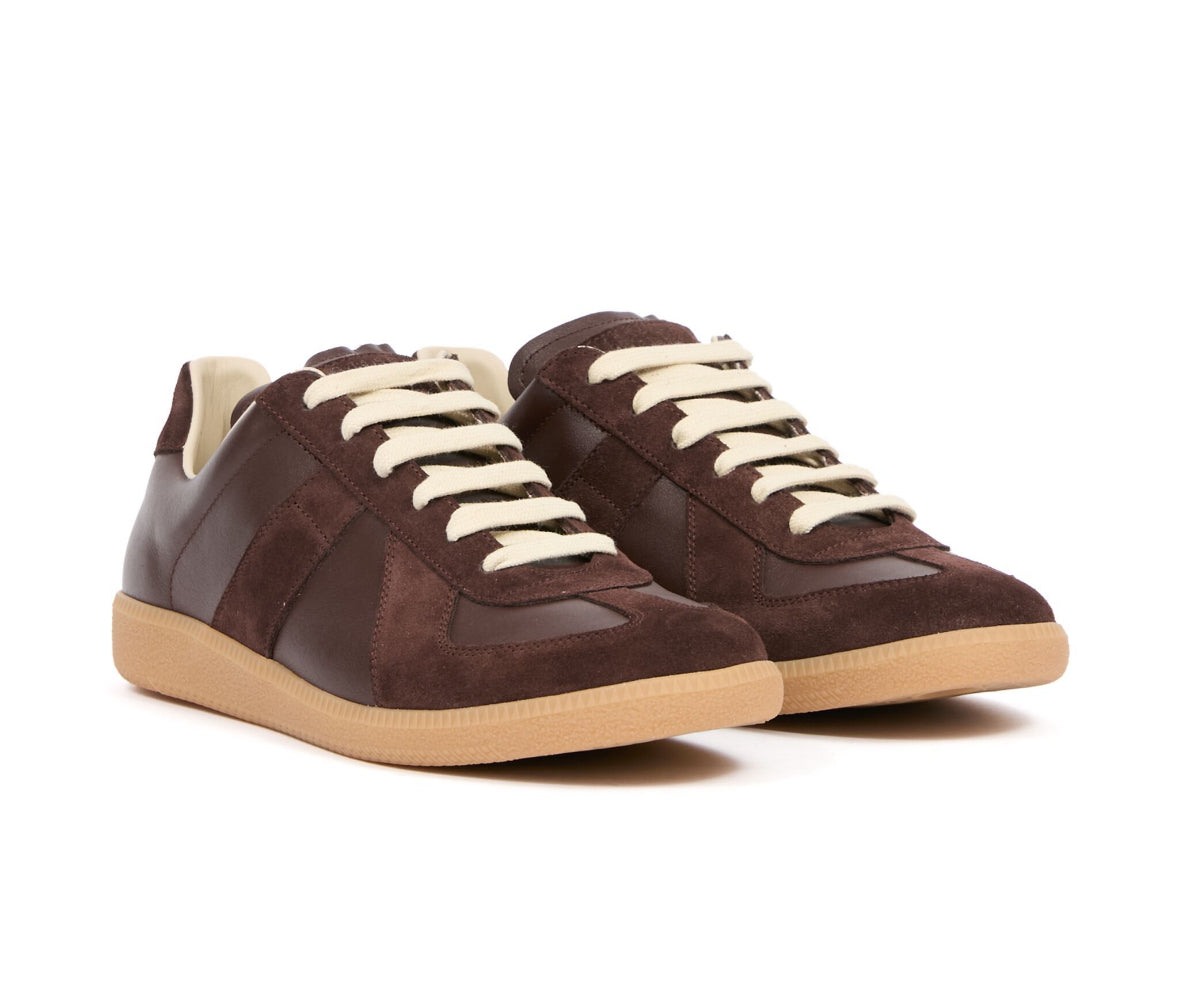 Maison Margiela
Replica panelled sneakers