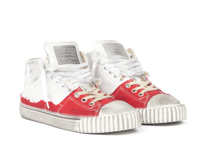 Maison Margiela
New Evolution panelled sneakers