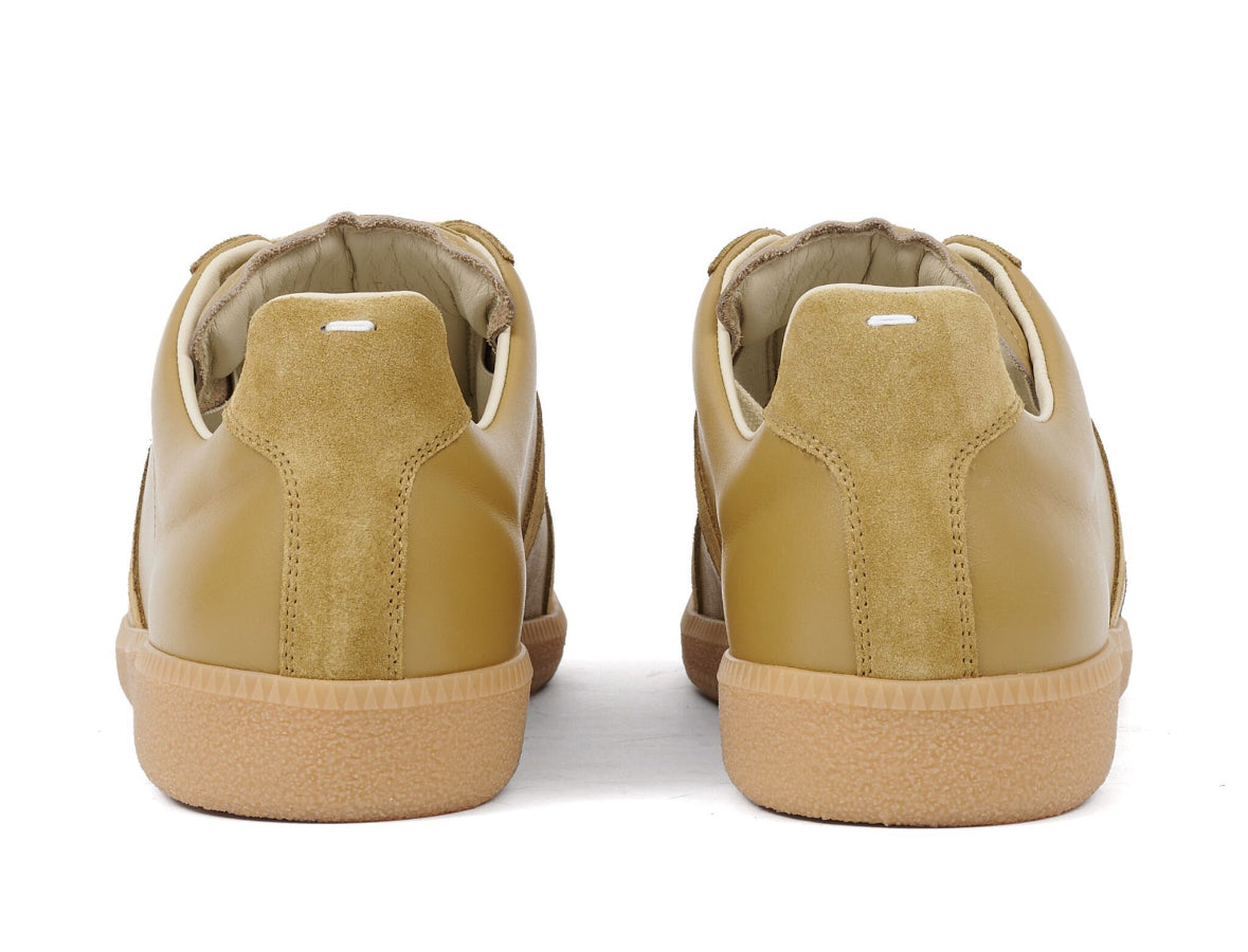 Maison Margiela
Replica leather sneakers
