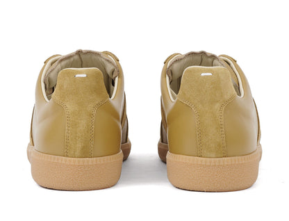 Maison Margiela
Replica leather sneakers