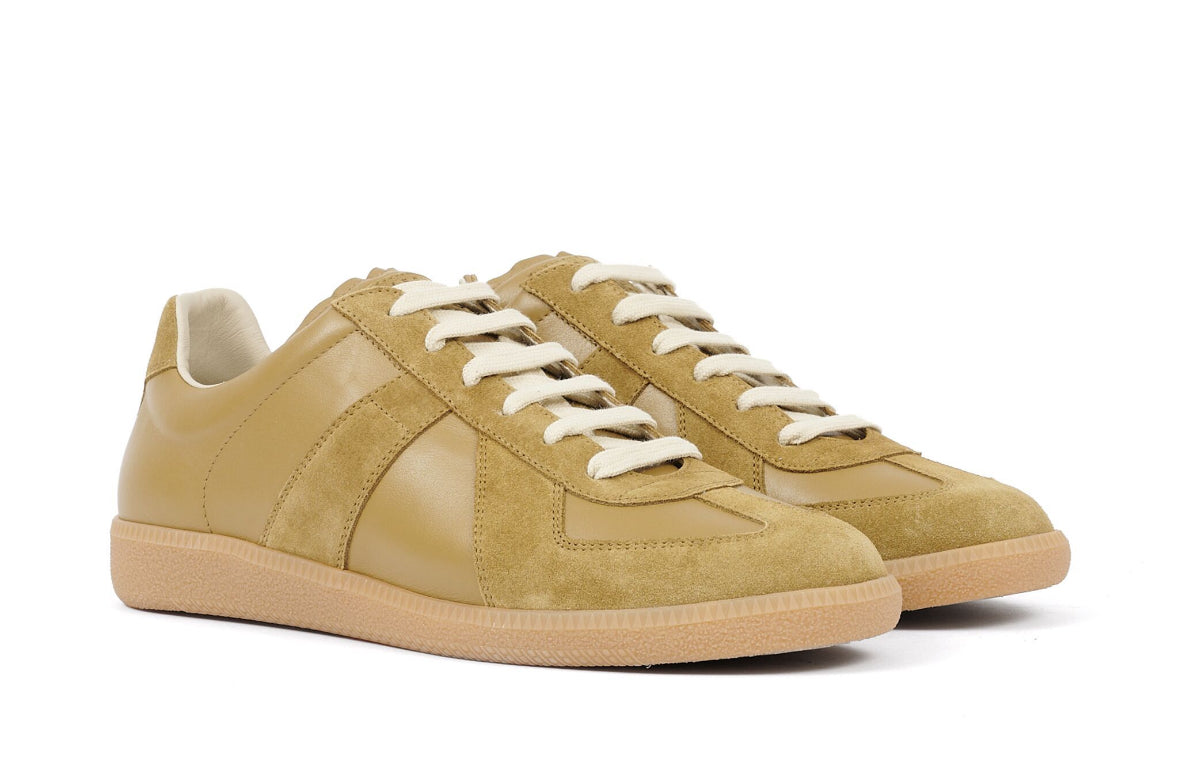 Maison Margiela
Replica leather sneakers