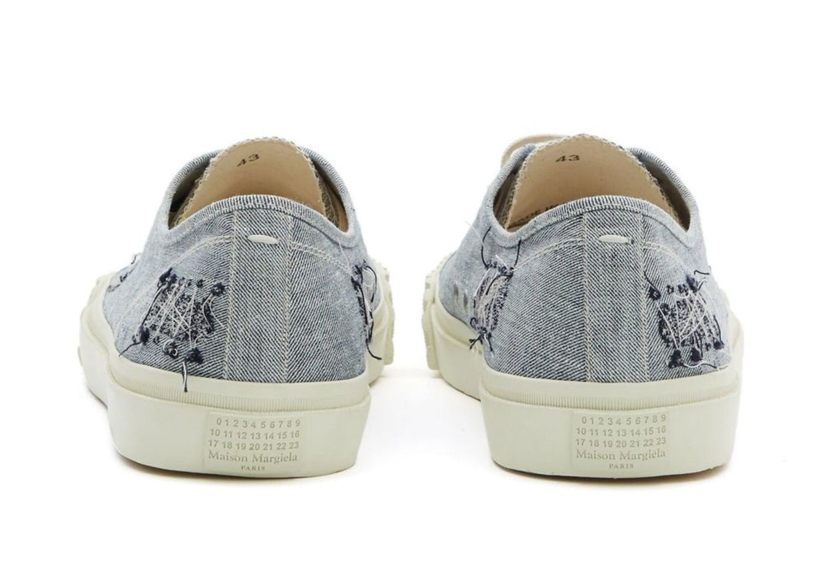 Maison Margiela
Tabi embroidered low-top sneakers