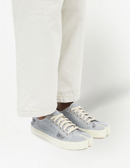 Maison Margiela
Tabi embroidered low-top sneakers
