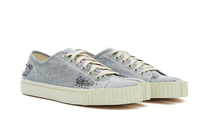 Maison Margiela
Tabi embroidered low-top sneakers
