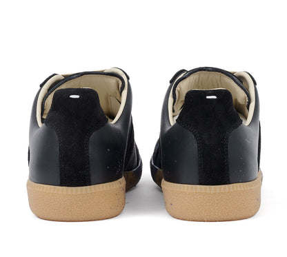 Maison Margiela
Paint Replica leather sneakers